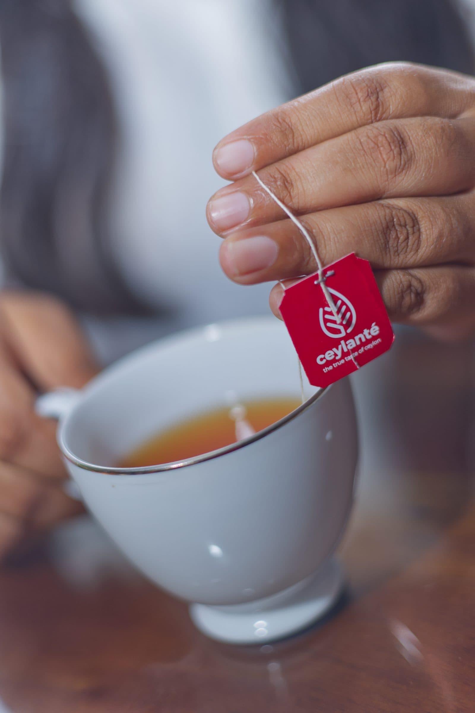 A finished Ceylon tea bag brewing